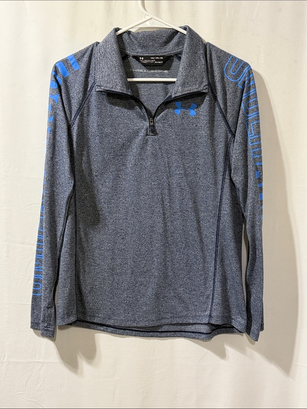 Under Armour Men’s Heather Gray 1/4 Zip Pullover with Blue Logo and Sleeve Text